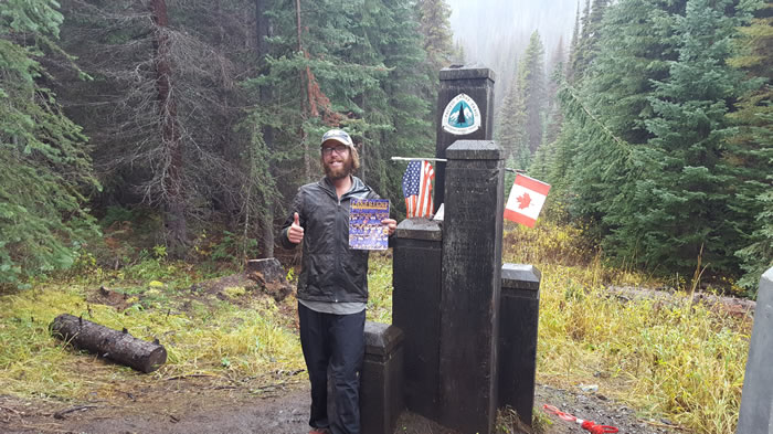 Mike Brown '07 completed a hike of the Pacific Crest Trail, which stretches from Mexico to Canada via California, Oregon, and Washington for 2,650 miles. It took him over 5 months to complete and this picture was taken at the Canadian border. 1692 Miles
